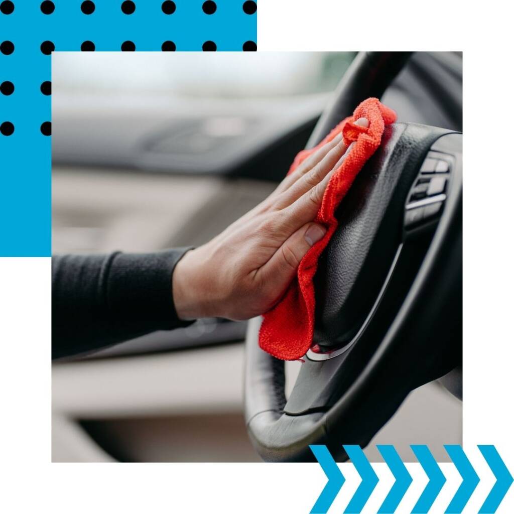 Wiping down car steering wheel