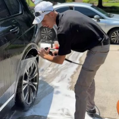 Samuel at work detailing a customer's vehicle