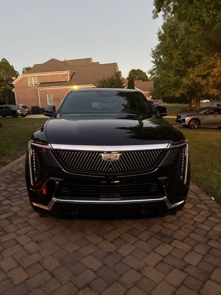 Front of a black Cadillac after a My Detail Buddy detail
