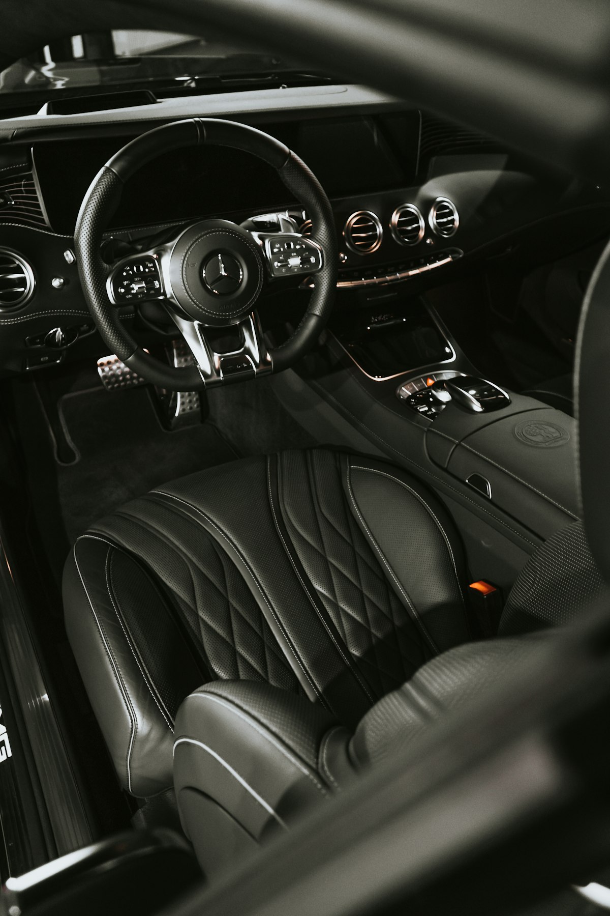 Clean car interior with headliner, seats and dashboard