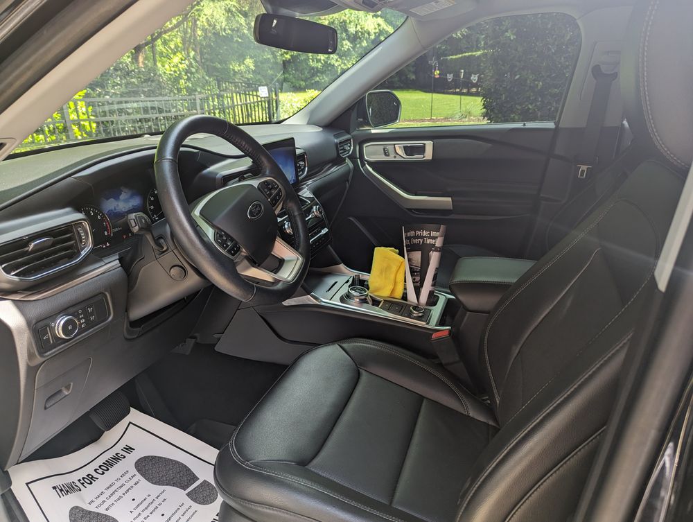 Leather front seats and dash after an interior detail